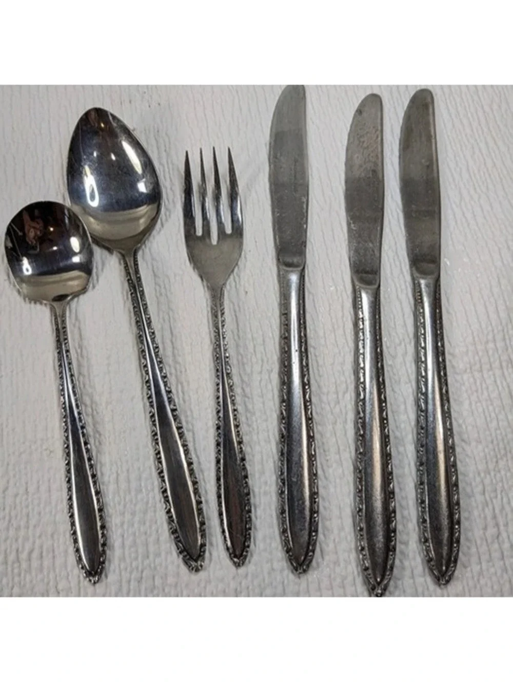Vintage Continental Stainless CSS1 3 dinner knives, sugar spoon, fork and spoon